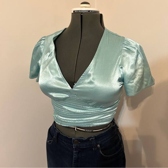 Guess Tops - Guess silky aqua crop top size XS